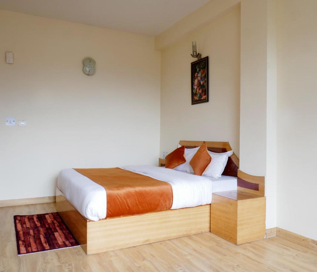 New Ambika International Mall Road Hotel 马拉里 外观 照片